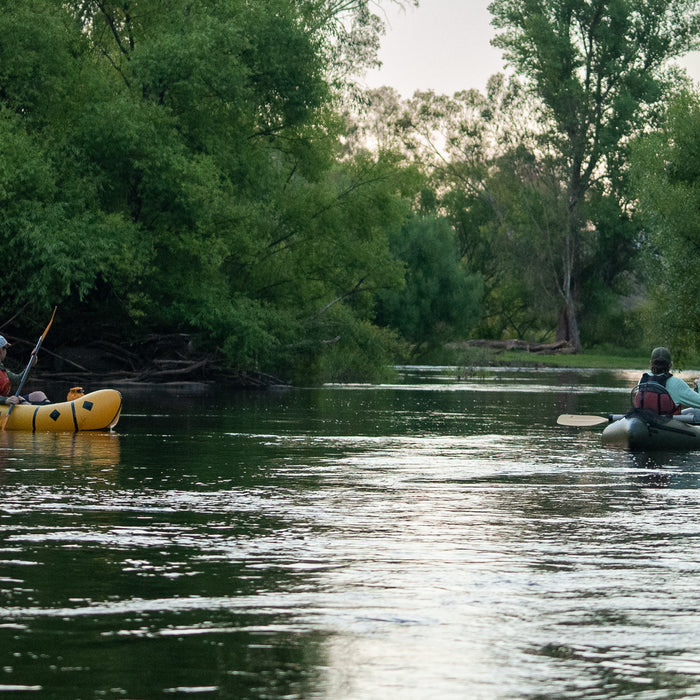 Chris and Jimmy paddling and fly fishing down the Goobarragandra river on Kokopelli packrafts