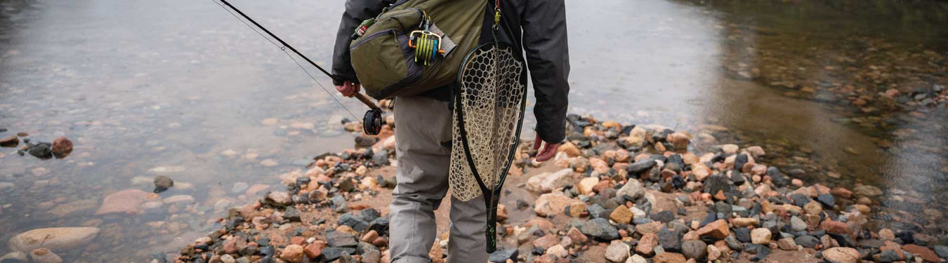 Fishpond net at home attached to a sling or backpack.