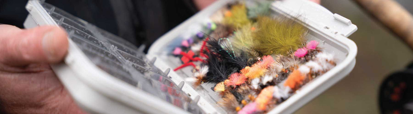C and F fly box filled with trout snacks