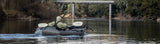 Pat relaxing in a Kokopelli Nirvana Packraft on Blowering Dam.